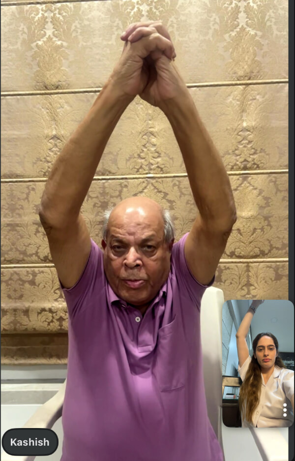 elderly person doing guided exercises at home